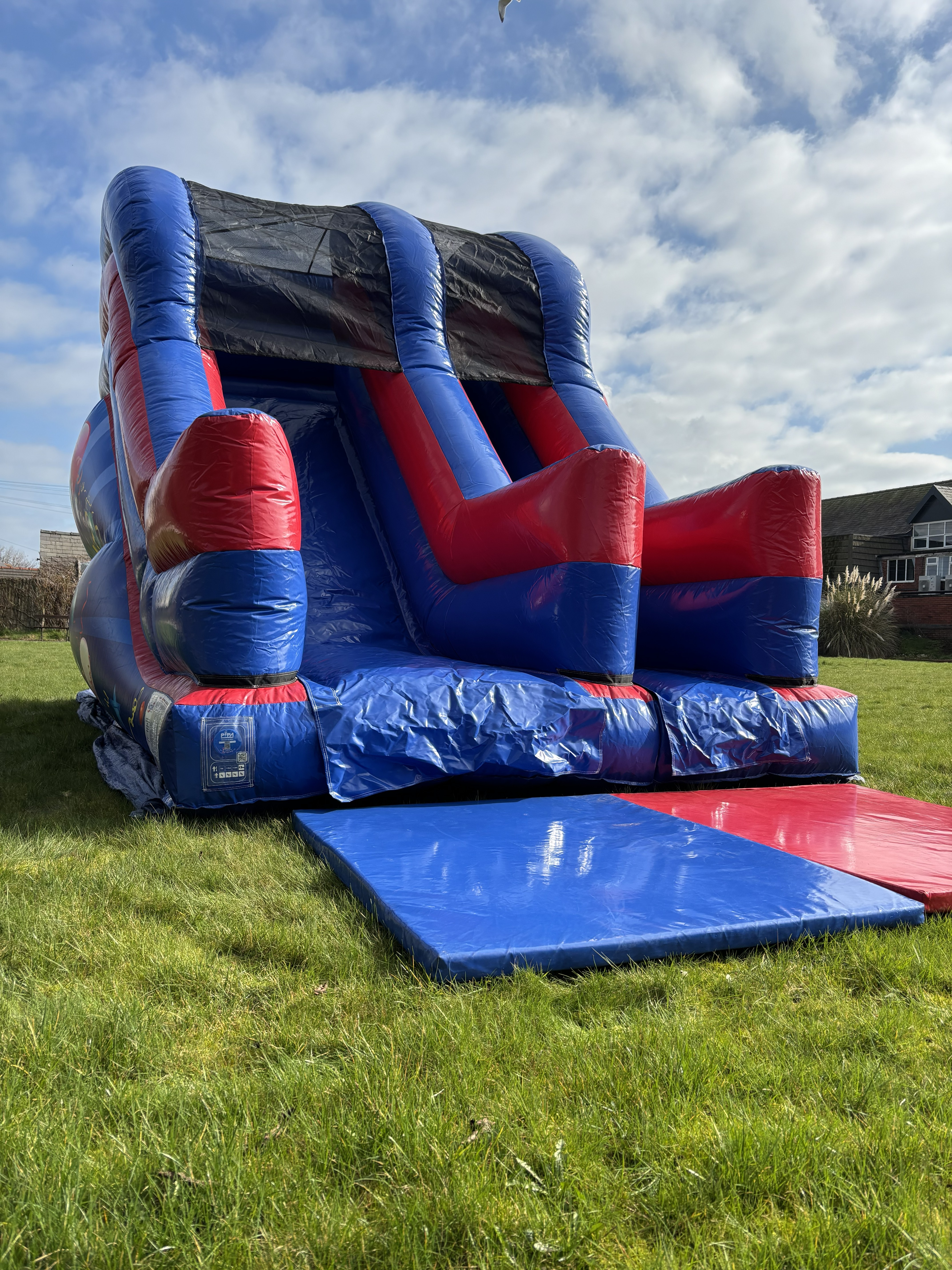 8ft platform inflatable slide for garden party hire in Blackpool by Fylde Coast Bouncy Castles